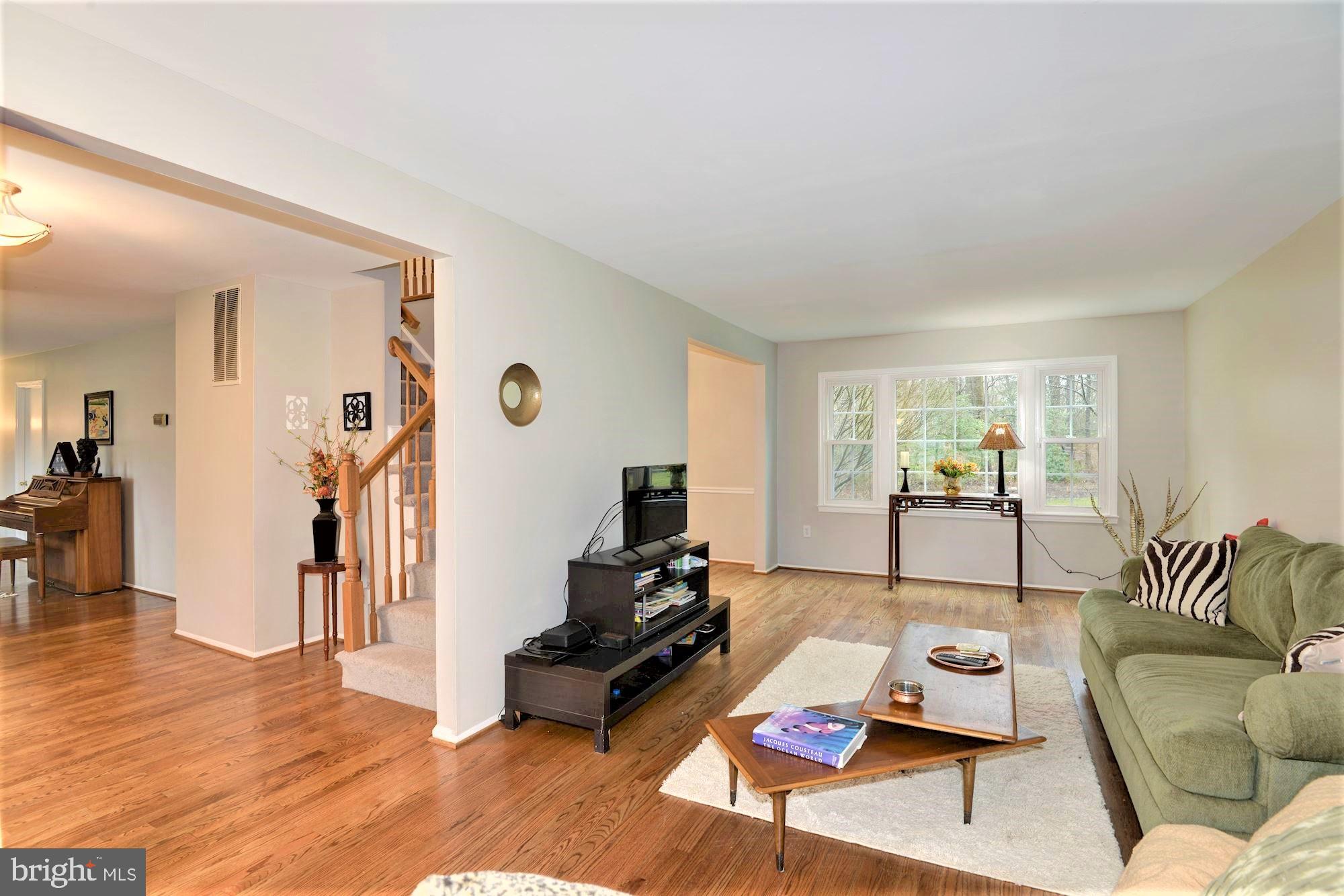 2305 Rosedown Drive Reston, VA 20191 - Photo 4 of 43 Large living room with new hard wood floors