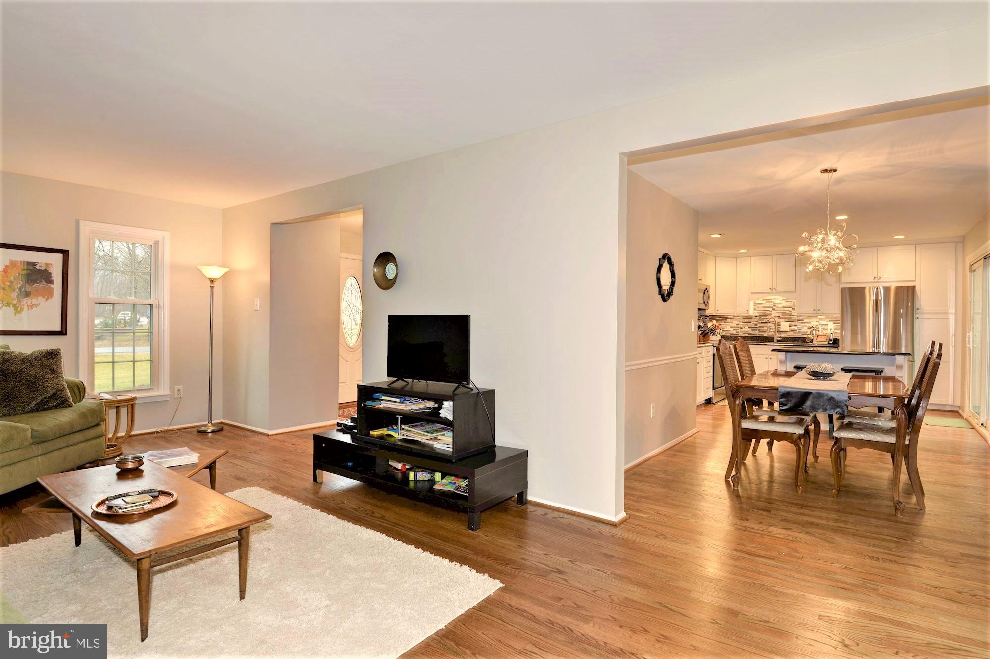 2305 Rosedown Drive Reston, VA 20191 - Photo 8 of 43 Dining room with new hardwood floors,light fixture