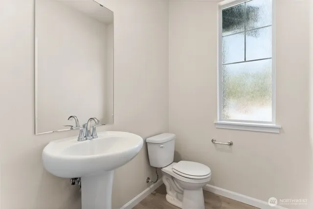 a bathroom with a sink and a toilet