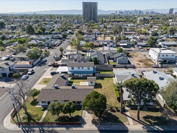 an aerial view of a house with a garden