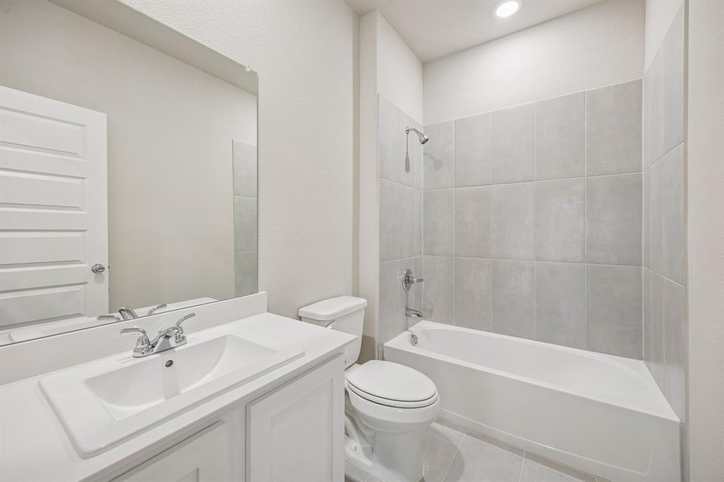 1404 Companero Street Haslet, TX 76052 - Photo 32 of 40 Bathroom in the Wimbledon home plan by Trophy Signature Homes – REPRESENTATIVE PHOTO
