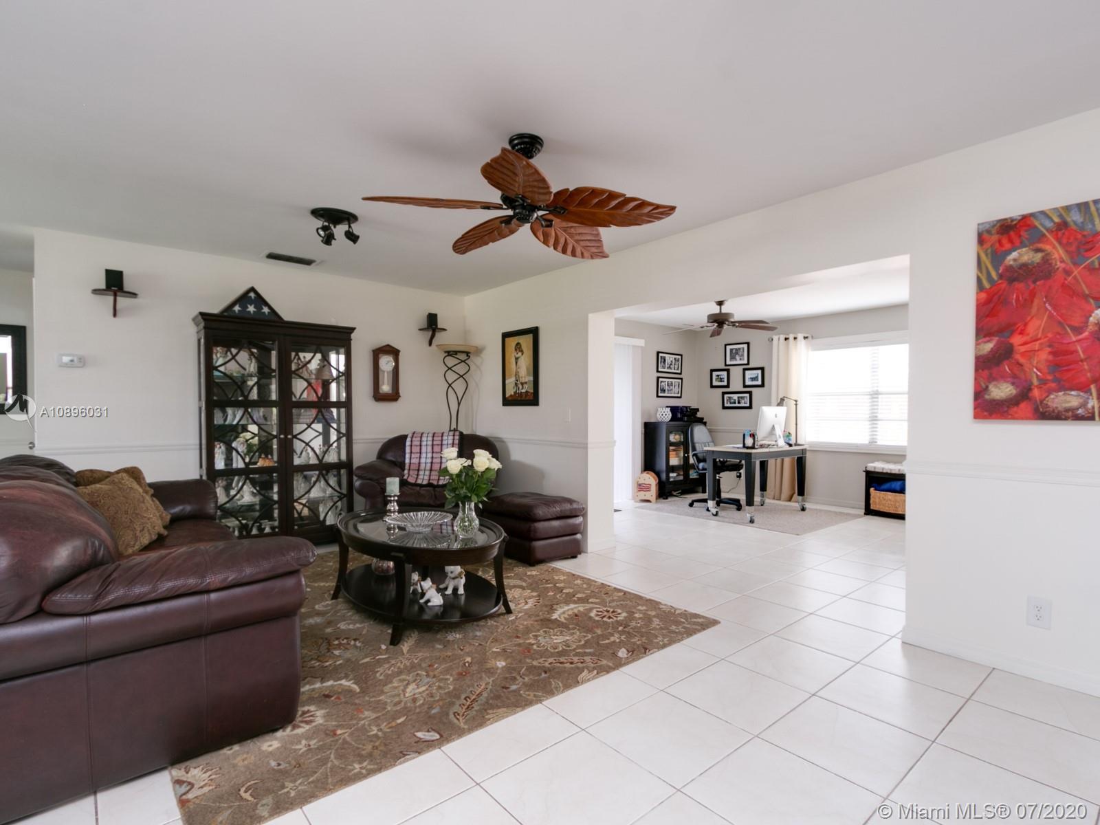 9518 Burlington Place Boca Raton, FL 33434 - Photo 14 of 35 a living room with furniture