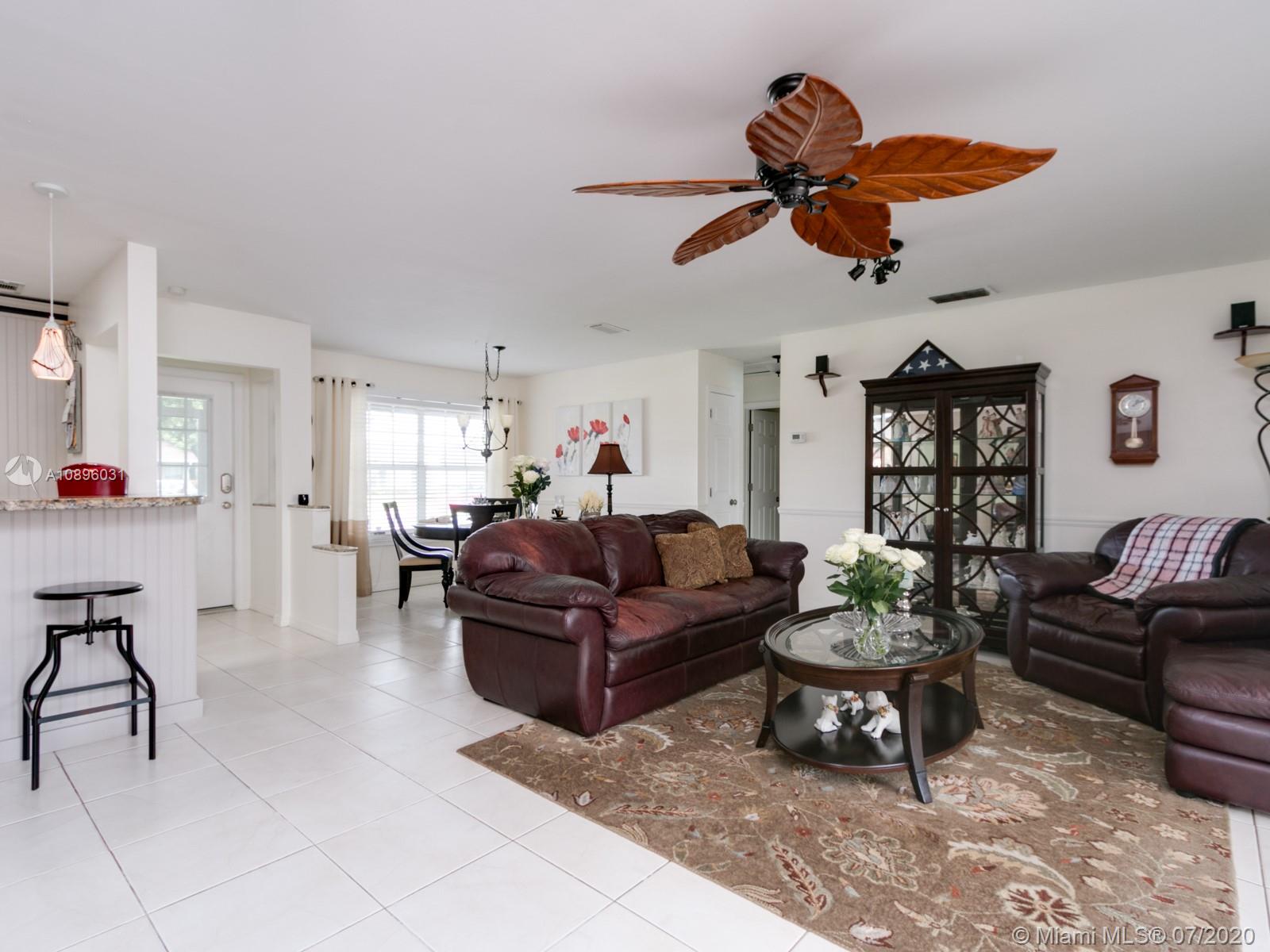 9518 Burlington Place Boca Raton, FL 33434 - Photo 15 of 35 a living room with furniture