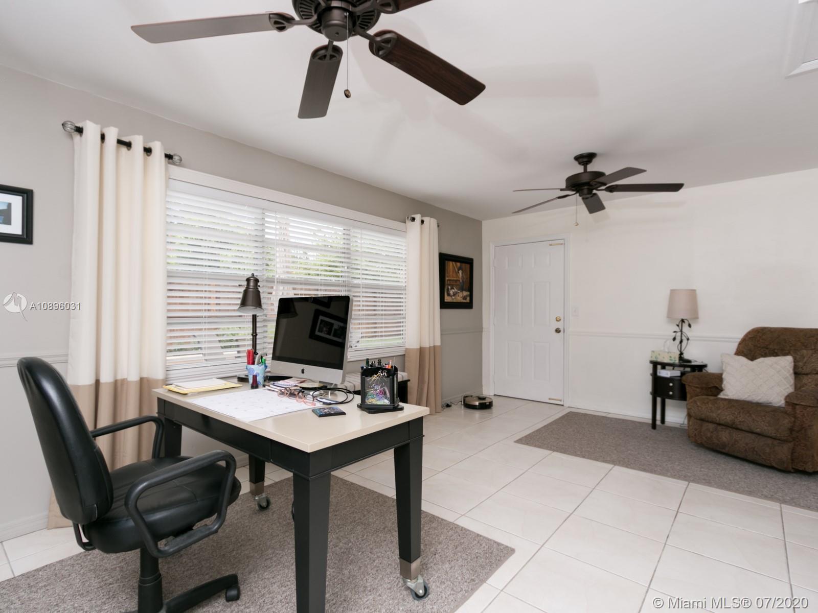 9518 Burlington Place Boca Raton, FL 33434 - Photo 17 of 35 a workspace with furniture and a window