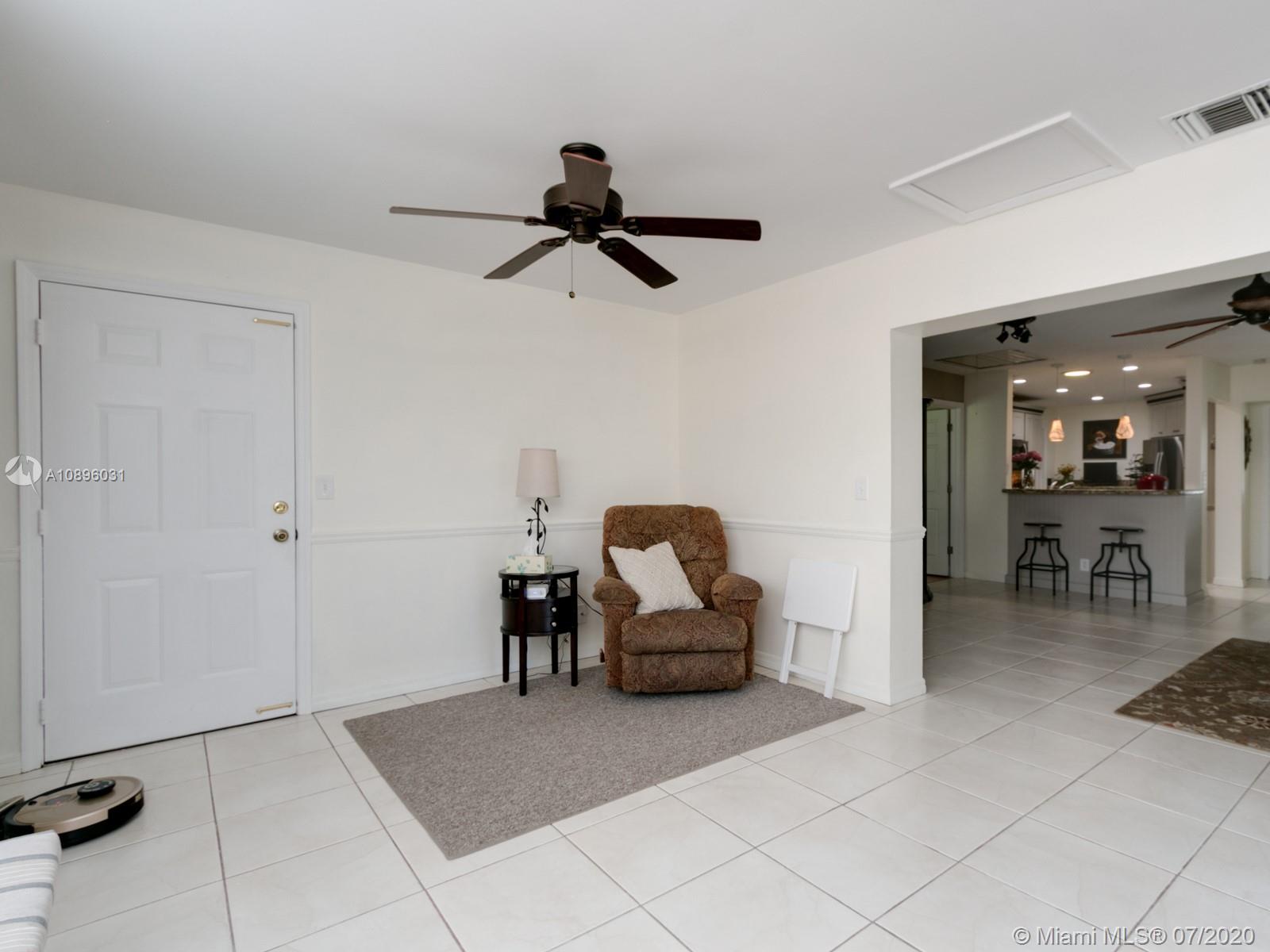 9518 Burlington Place Boca Raton, FL 33434 - Photo 18 of 35 a living room with furniture