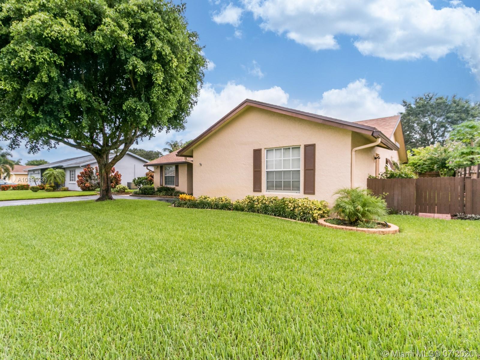9518 Burlington Place Boca Raton, FL 33434 - Photo 3 of 35 a view of a house with backyard