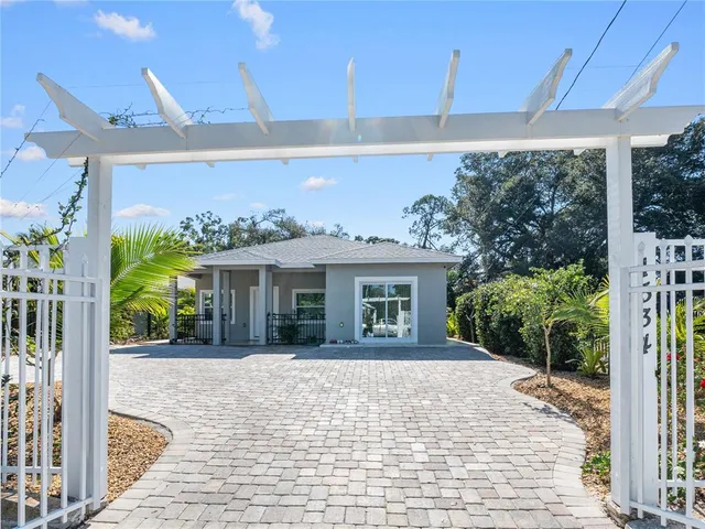 a front view of a house with a porch