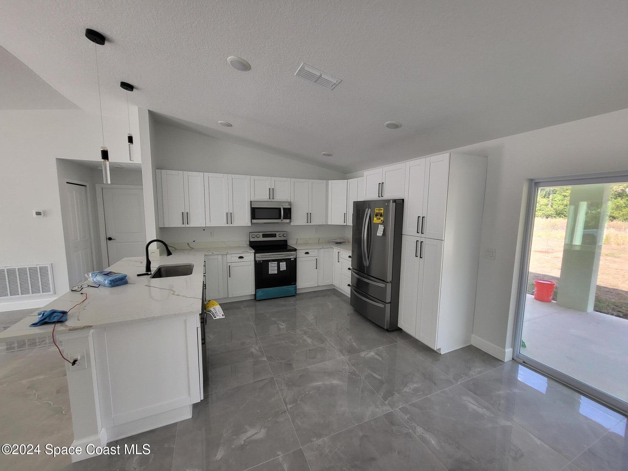 1281 Hastings Road Southwest Palm Bay, FL 32908 - Photo 6 of 13 5-20240410_160837