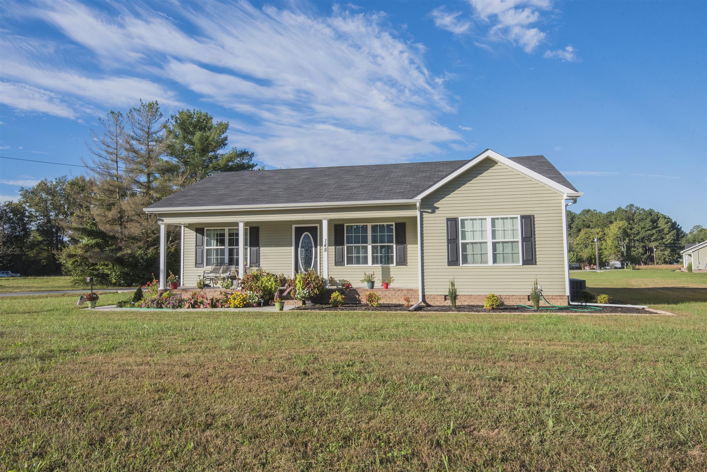 148 New Hope Road Manchester, TN 37355 - Photo 1 of 30 a front view of a house with a yard