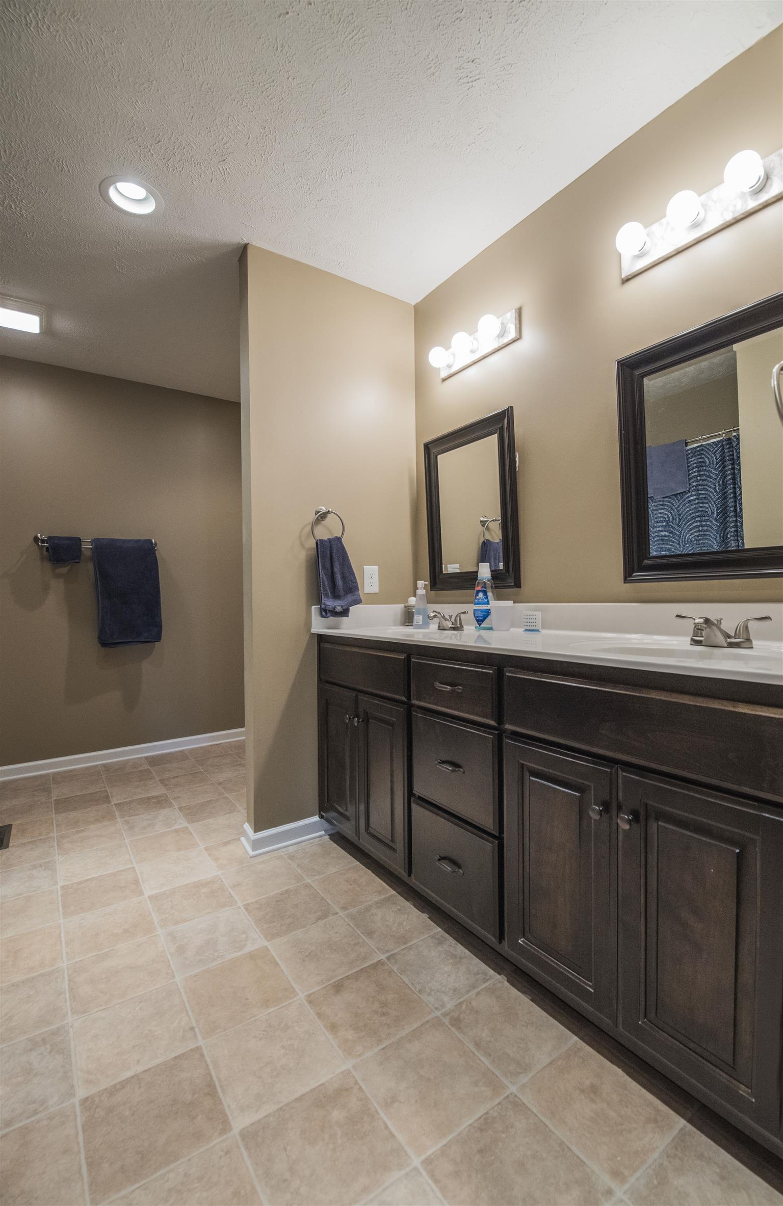 148 New Hope Road Manchester, TN 37355 - Photo 22 of 30 a bath room with a sink and a mirror