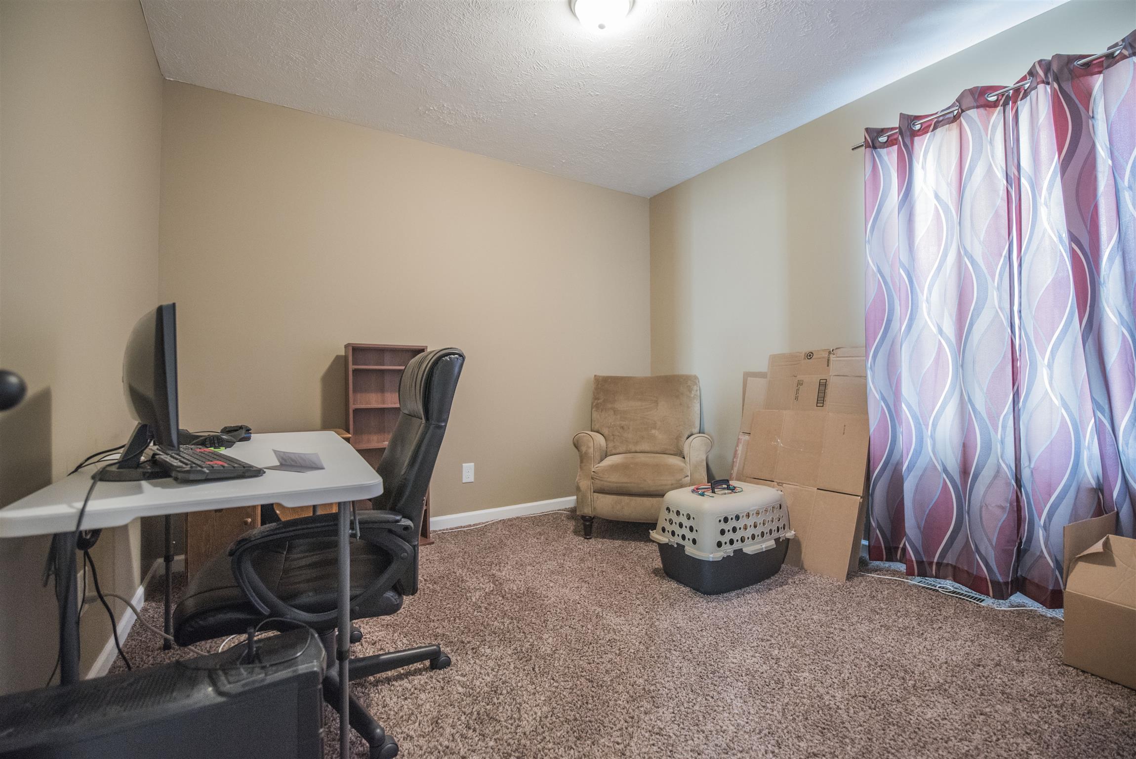 148 New Hope Road Manchester, TN 37355 - Photo 25 of 30 a workspace with furniture and a window