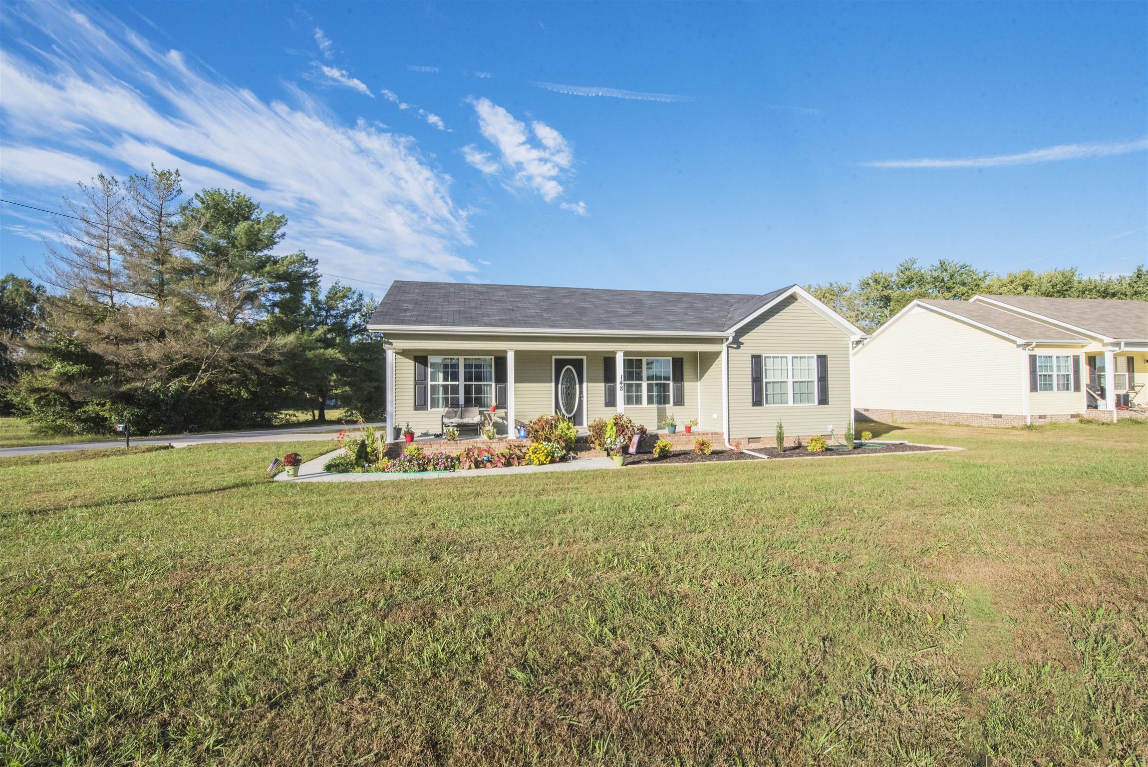 148 New Hope Road Manchester, TN 37355 - Photo 26 of 30 a view of a house with backyard and sitting area