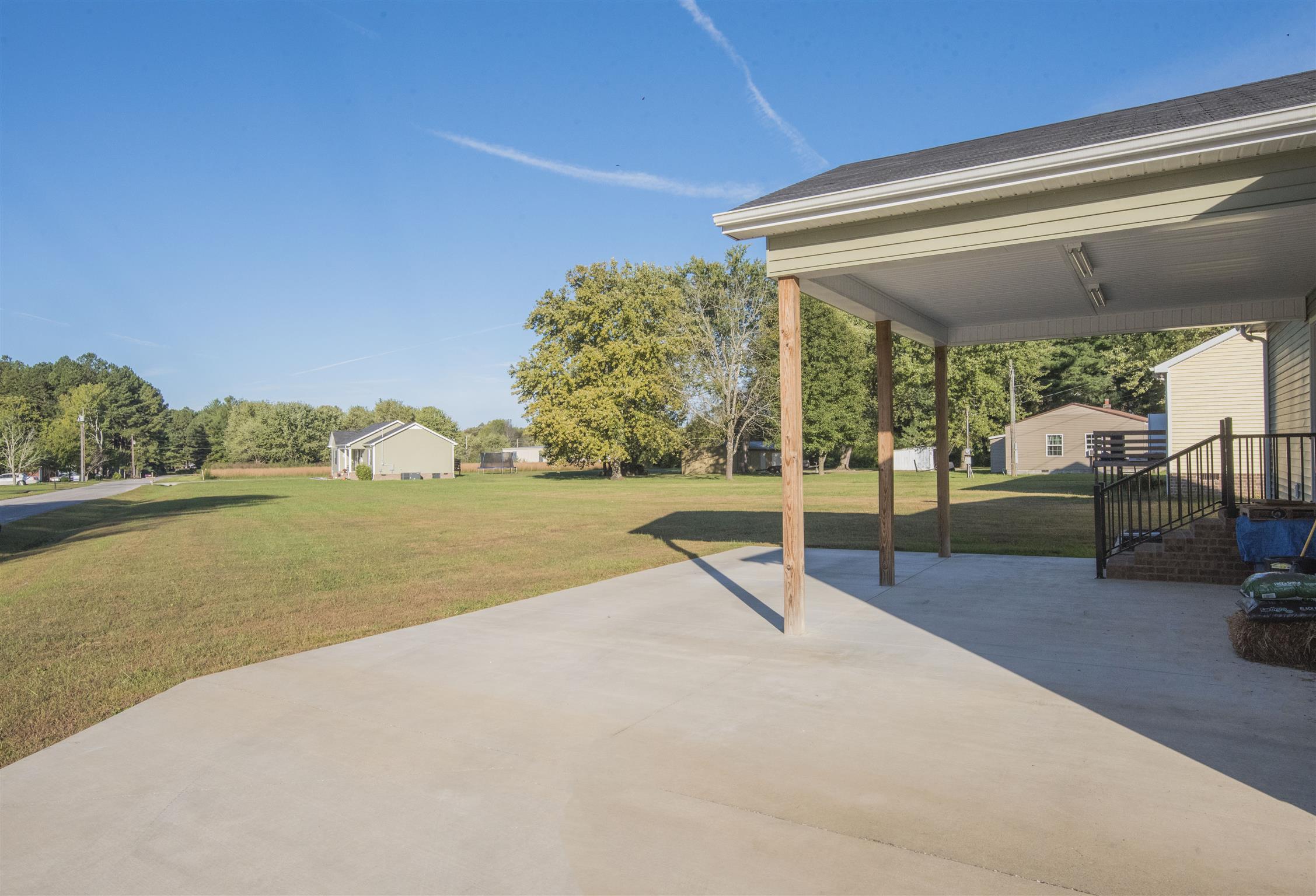 148 New Hope Road Manchester, TN 37355 - Photo 7 of 30 a view of a swimming pool with a patio and a yard