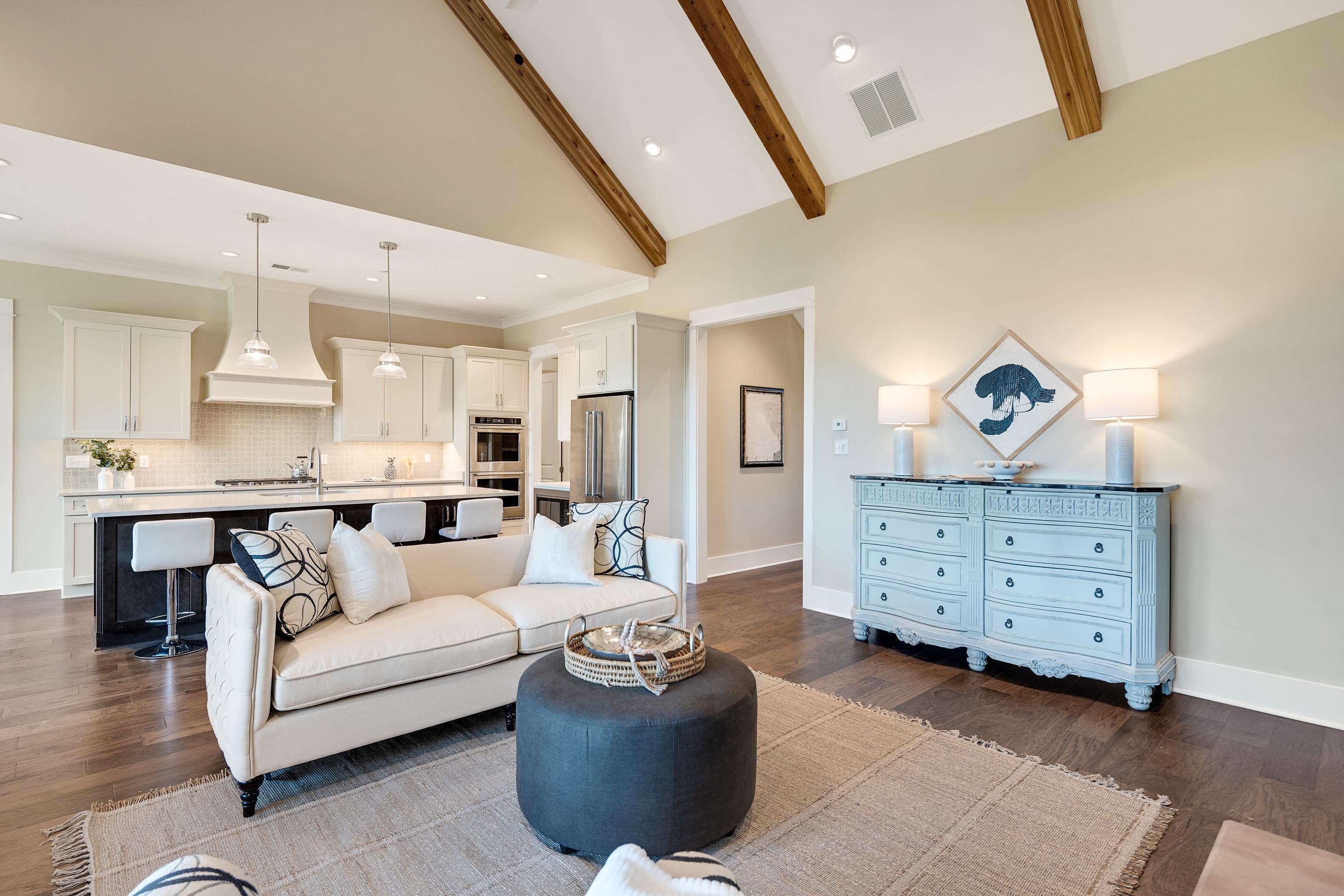 10136 Cliveden Circle North Collierville, TN 38017 - Photo 11 of 39 Living room with dark wood-style floors, beamed ceiling, high vaulted ceiling, and recessed lighting