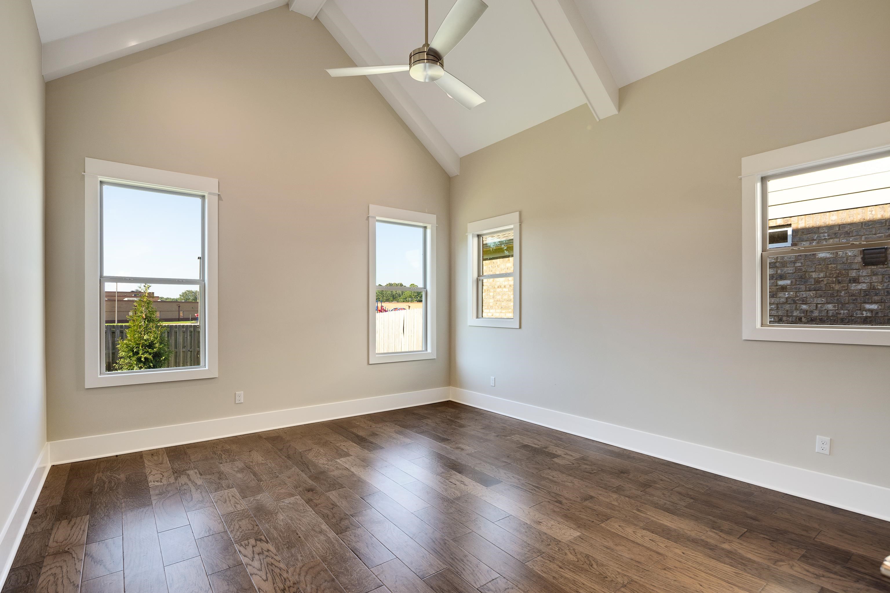 10136 Cliveden Circle North Collierville, TN 38017 - Photo 18 of 39 Hardwood floors and Vaulted Ceiling with beams