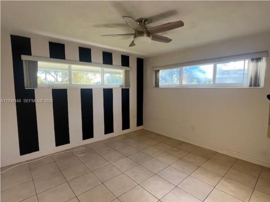 7281 Sunset Strip Sunrise, FL 33313 - Photo 13 of 25 a view of a livingroom with an entryway