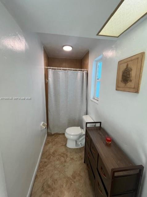 7281 Sunset Strip Sunrise, FL 33313 - Photo 17 of 25 a bathroom with a sink and a mirror