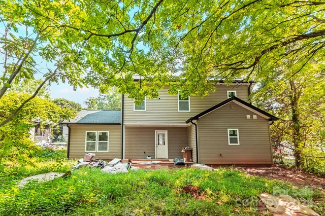 front view of a house with a small yard