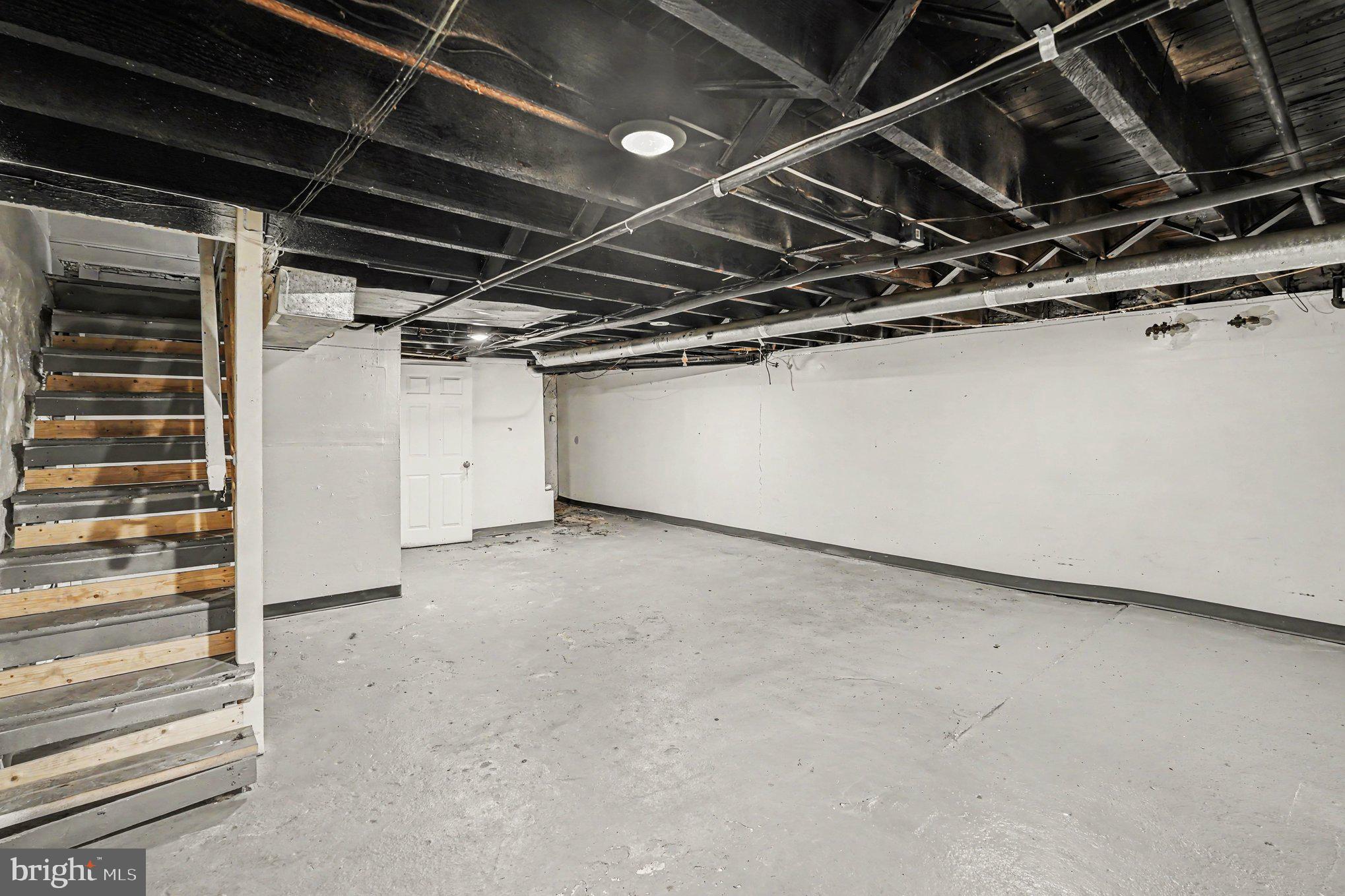 409 Edgewood Street Baltimore, MD 21229 - Photo 22 of 30 a view of under construction room and stairs