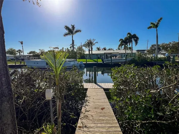 a view of a balcony with chairs