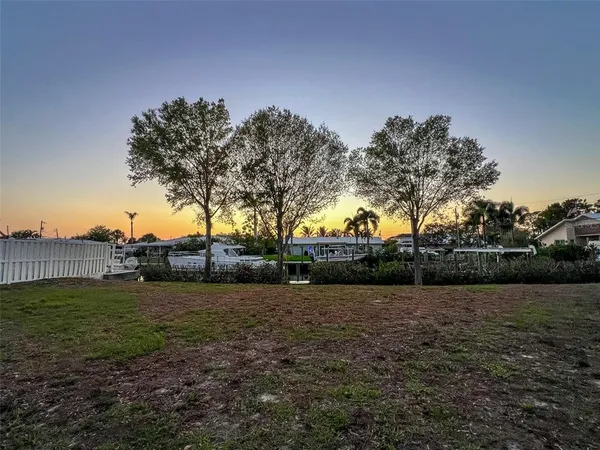 a view of swimming pool with a yard