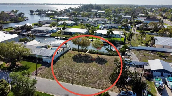 an aerial view of a house with outdoor space