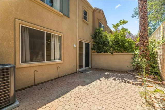 a view of a back yard of the house