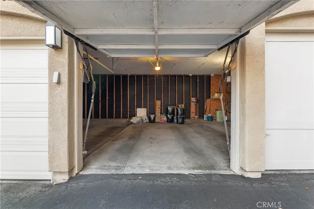 a view of a room with wooden floor and window