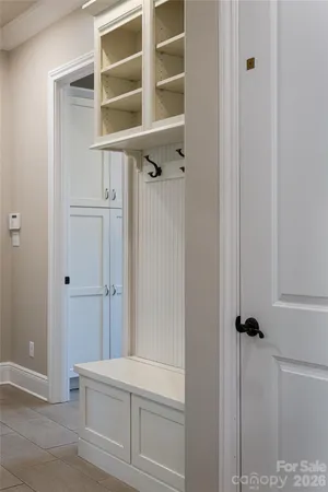 a spacious bathroom with sinks mirror and a bathtub