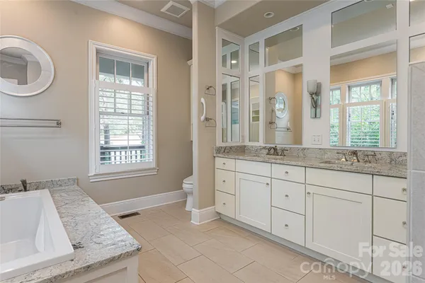 a view of a kitchen that has a sink and a stove