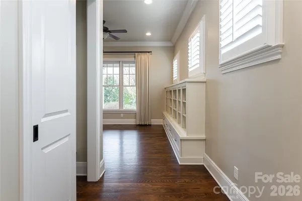 a view of entryway with wooden floor