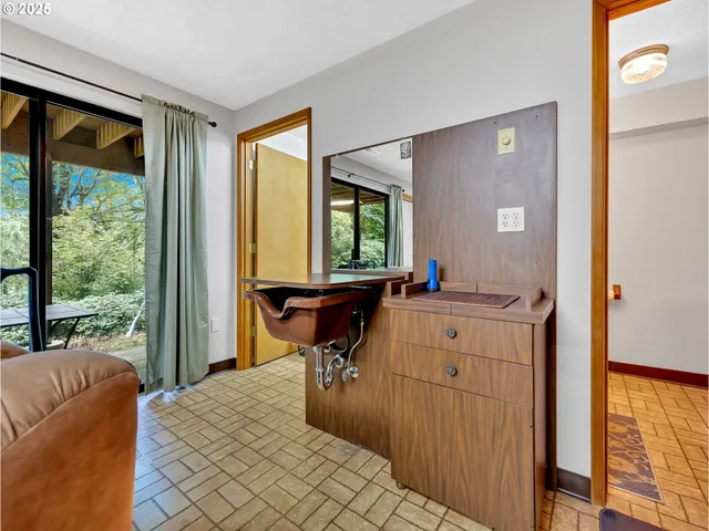a utility room with a sink a washer and dryer