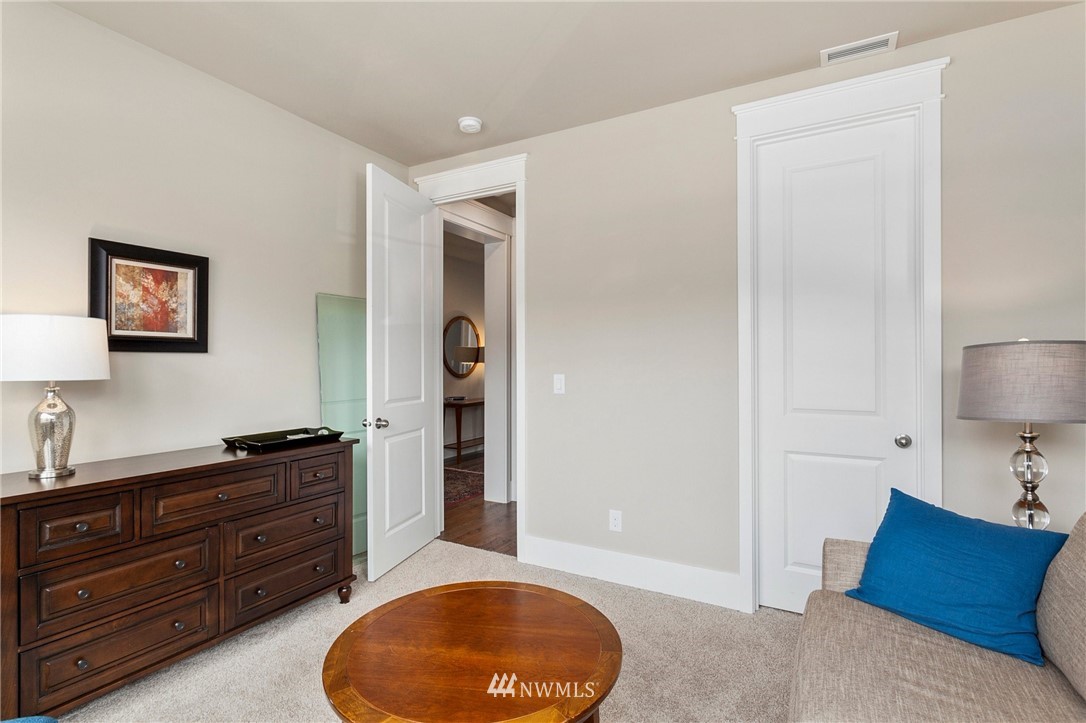 302 Graham Avenue Southeast Renton, WA 98059 - Photo 14 of 34 a living room with furniture and painting on the wall