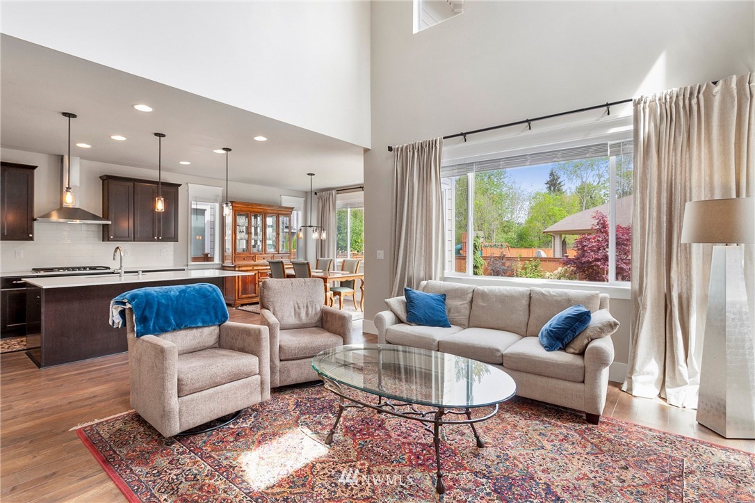 302 Graham Avenue Southeast Renton, WA 98059 - Photo 5 of 34 a living room with furniture and a large window