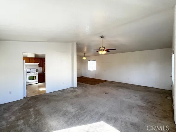 an empty room with shelves