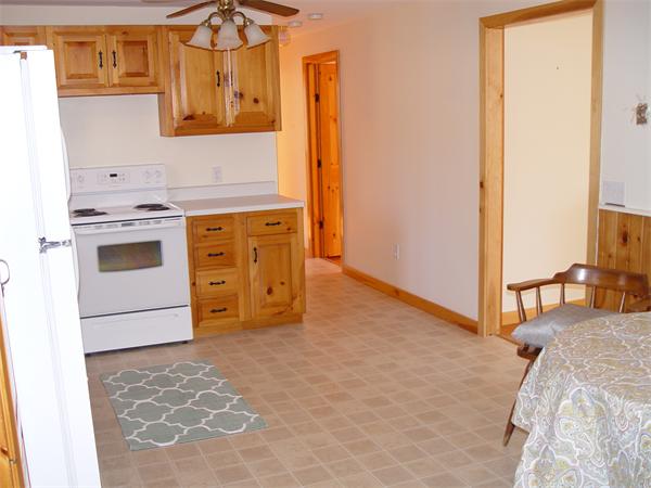 1196 Richardson Road Ashby, MA 01431 - Photo 18 of 29 a view of a bedroom with a bed and cabinets
