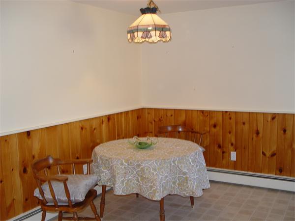 1196 Richardson Road Ashby, MA 01431 - Photo 20 of 29 a bed sitting in a room next to a window