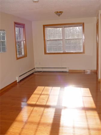 1196 Richardson Road Ashby, MA 01431 - Photo 25 of 29 a view of an empty room with a window