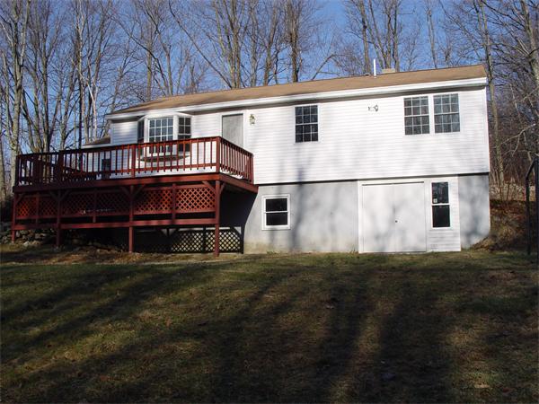 1196 Richardson Road Ashby, MA 01431 - Photo 4 of 29 a view of a house with a yard
