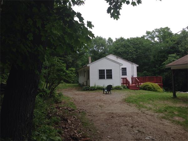 1196 Richardson Road Ashby, MA 01431 - Photo 5 of 29 a view of a house with a yard