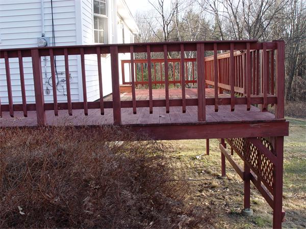 1196 Richardson Road Ashby, MA 01431 - Photo 10 of 29 a view of a back yard with a wooden fence
