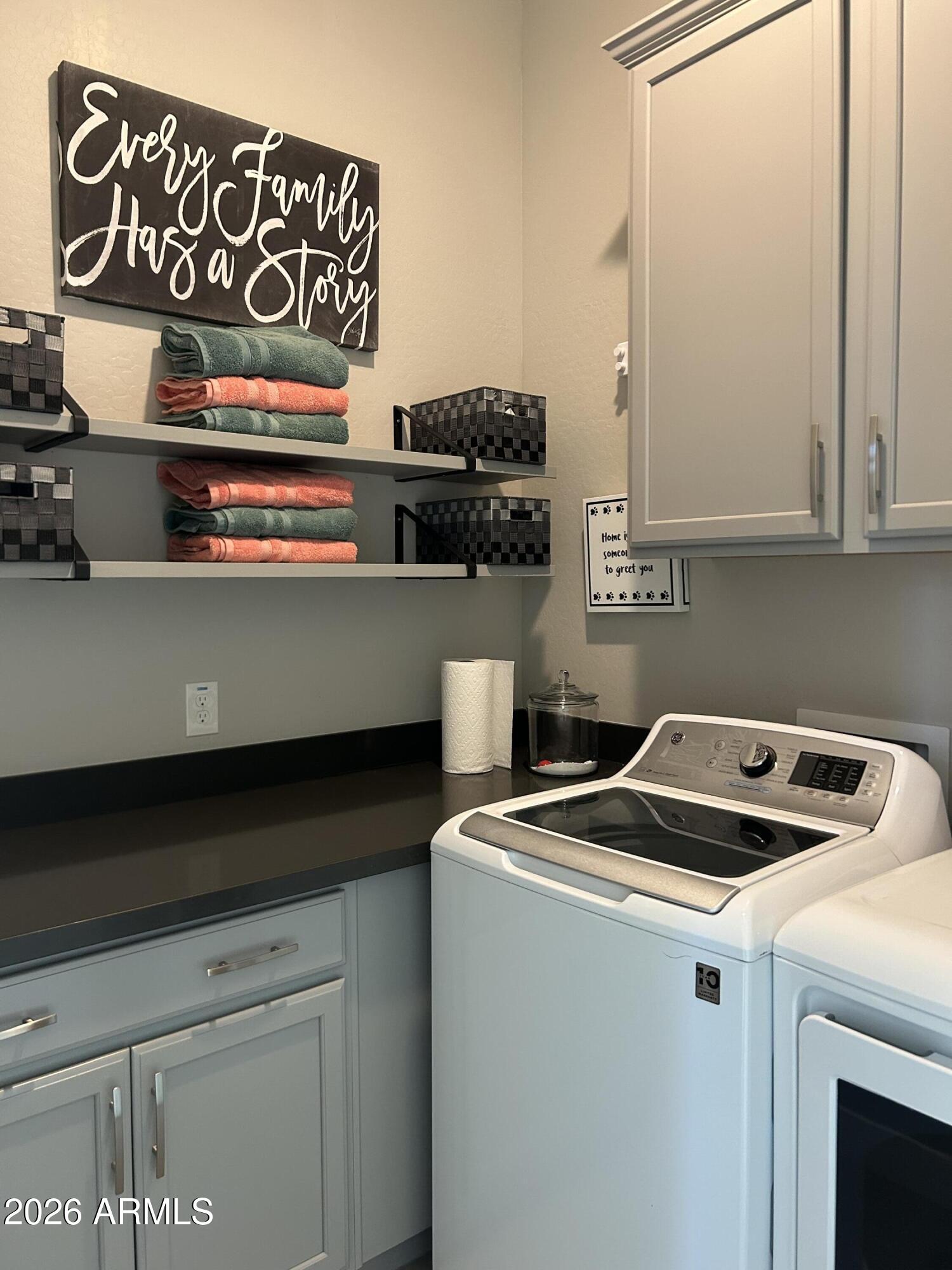 18828 East Blue Sky Drive Rio Verde, AZ 85263 - Photo 13 of 13 a utility room with dryer and washer