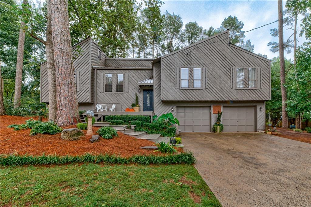 722 Jett Road Woodstock, GA 30188 - Photo 1 of 1 Lovely remodeled home with Woodstock Address, close to Roswell, Milton and Woodstock
