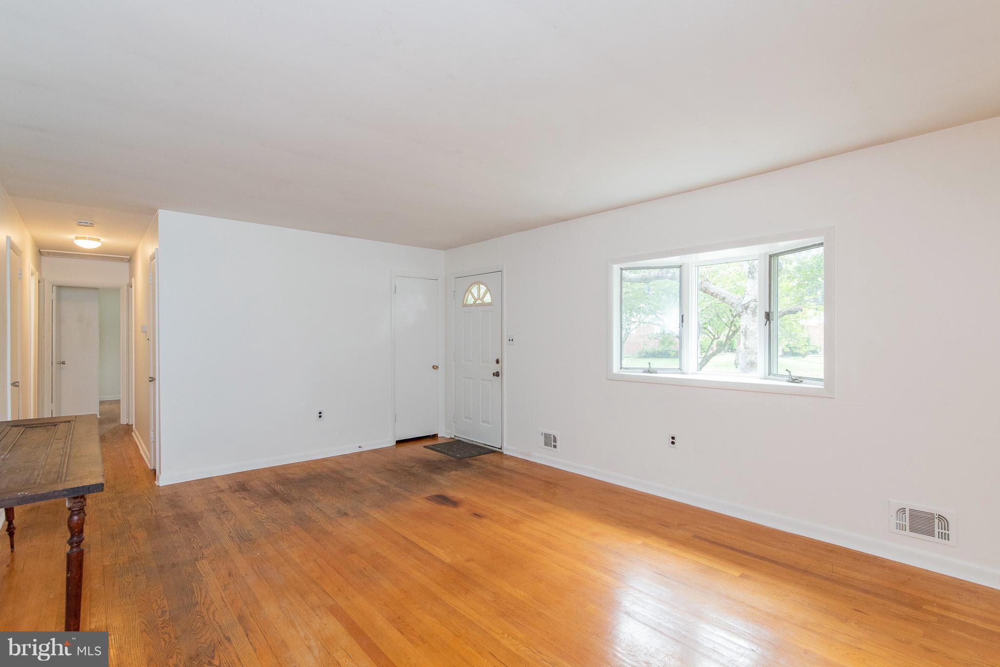 615 Eliot Road Pasadena, MD 21122 - Photo 2 of 43 an empty room with a window