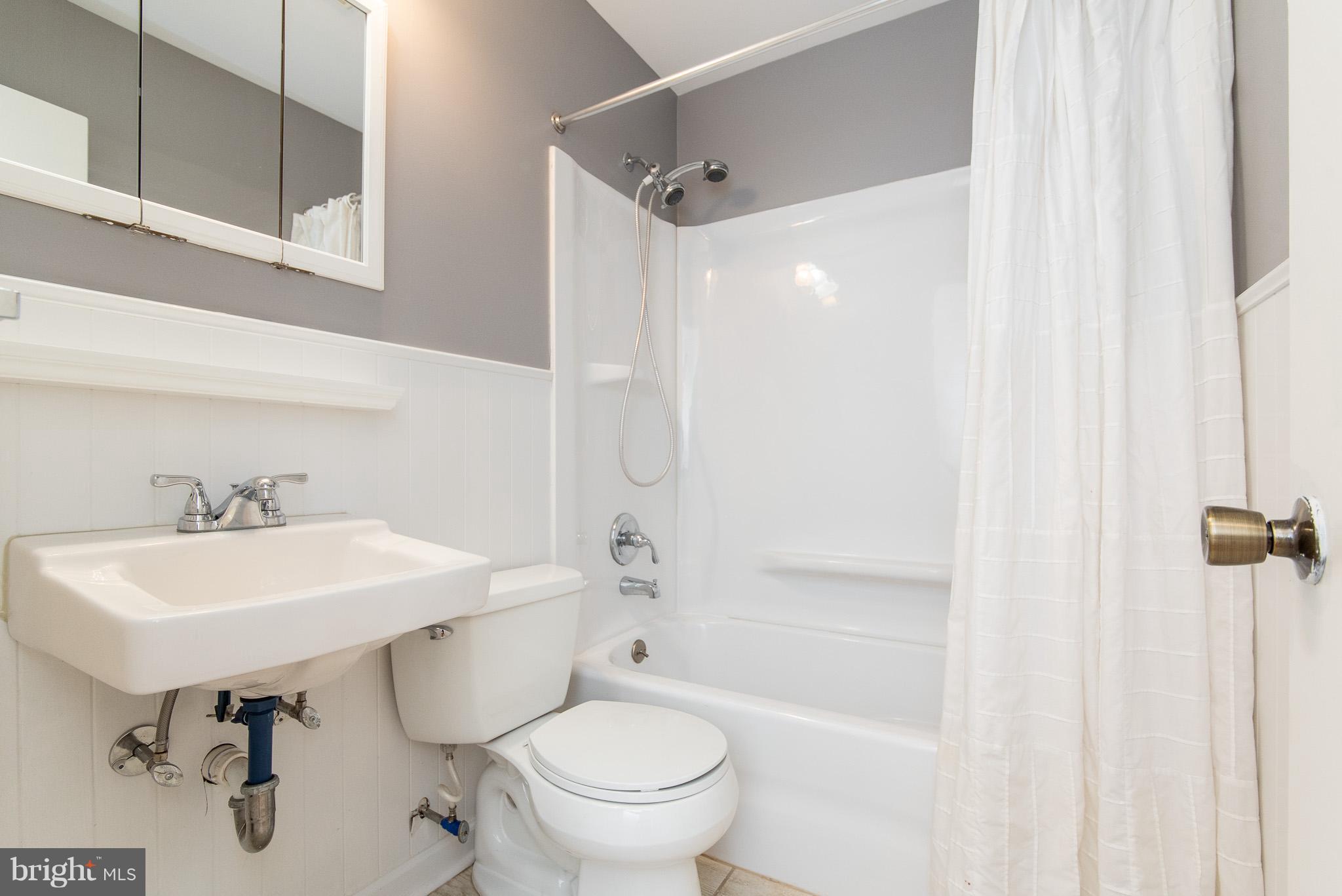 615 Eliot Road Pasadena, MD 21122 - Photo 25 of 43 a bathroom with a sink toilet and shower