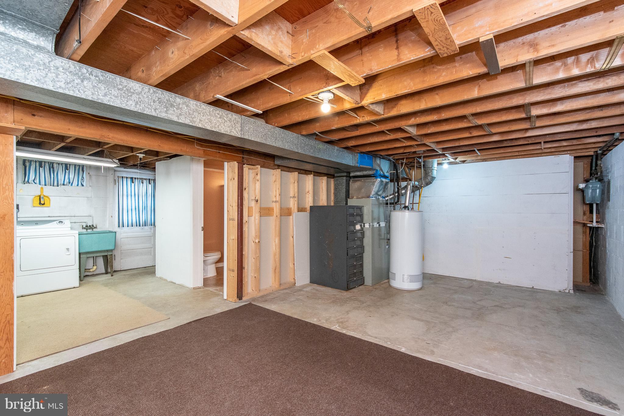 615 Eliot Road Pasadena, MD 21122 - Photo 36 of 43 a view of empty room with wooden ceiling
