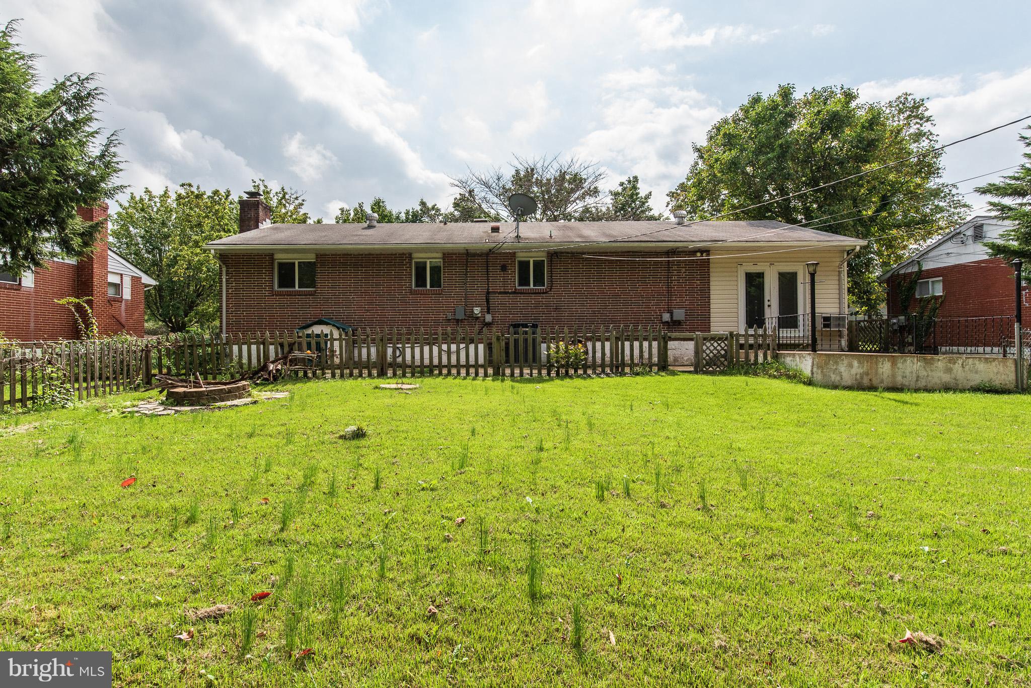 615 Eliot Road Pasadena, MD 21122 - Photo 42 of 43 a front view of house with yard and green space