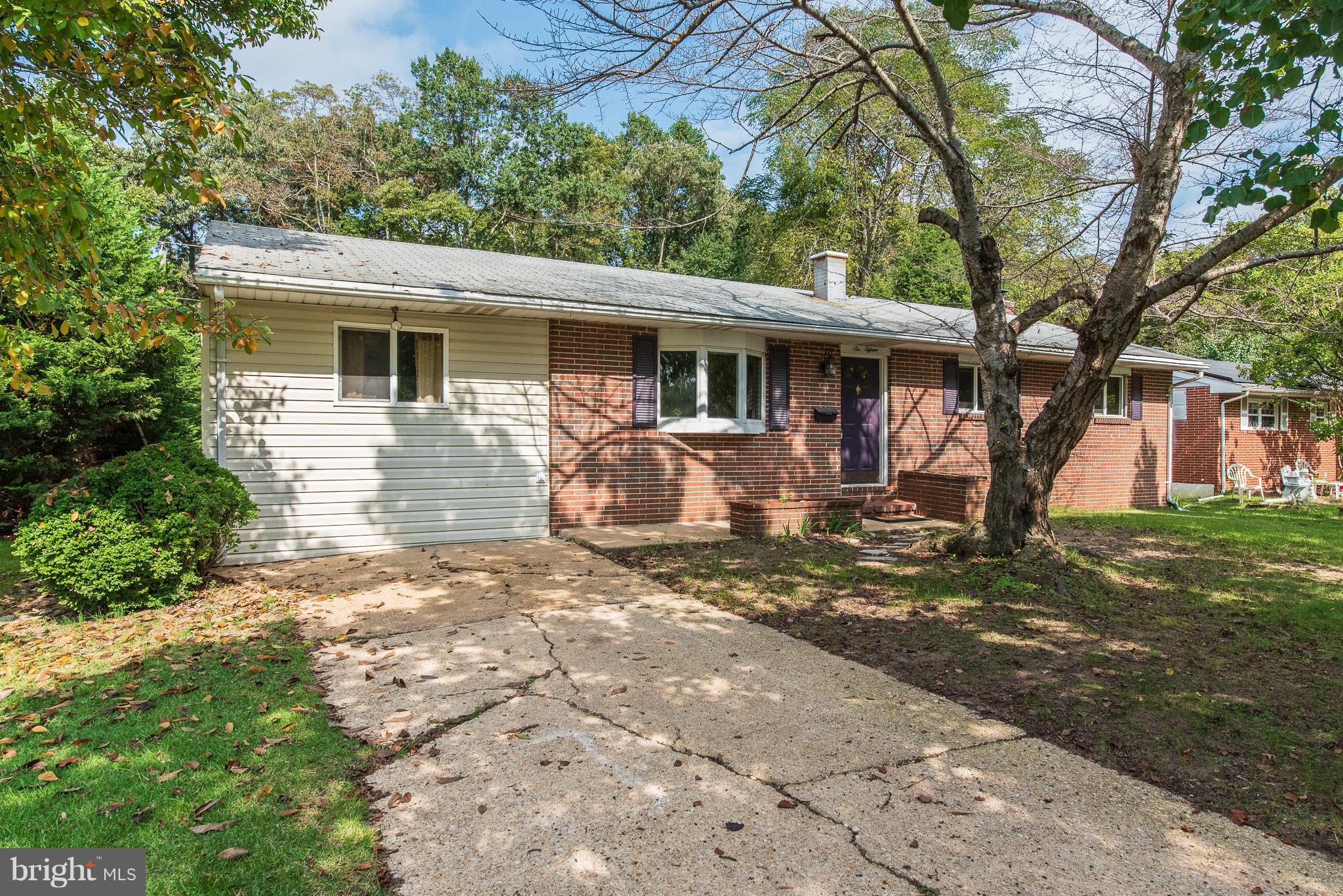 615 Eliot Road Pasadena, MD 21122 - Photo 43 of 43 a front view of a house with garden