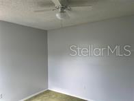 31 Lakepointe Circle Kissimmee, FL 34743 - Photo 20 of 28 a view of a room with racks on the wall