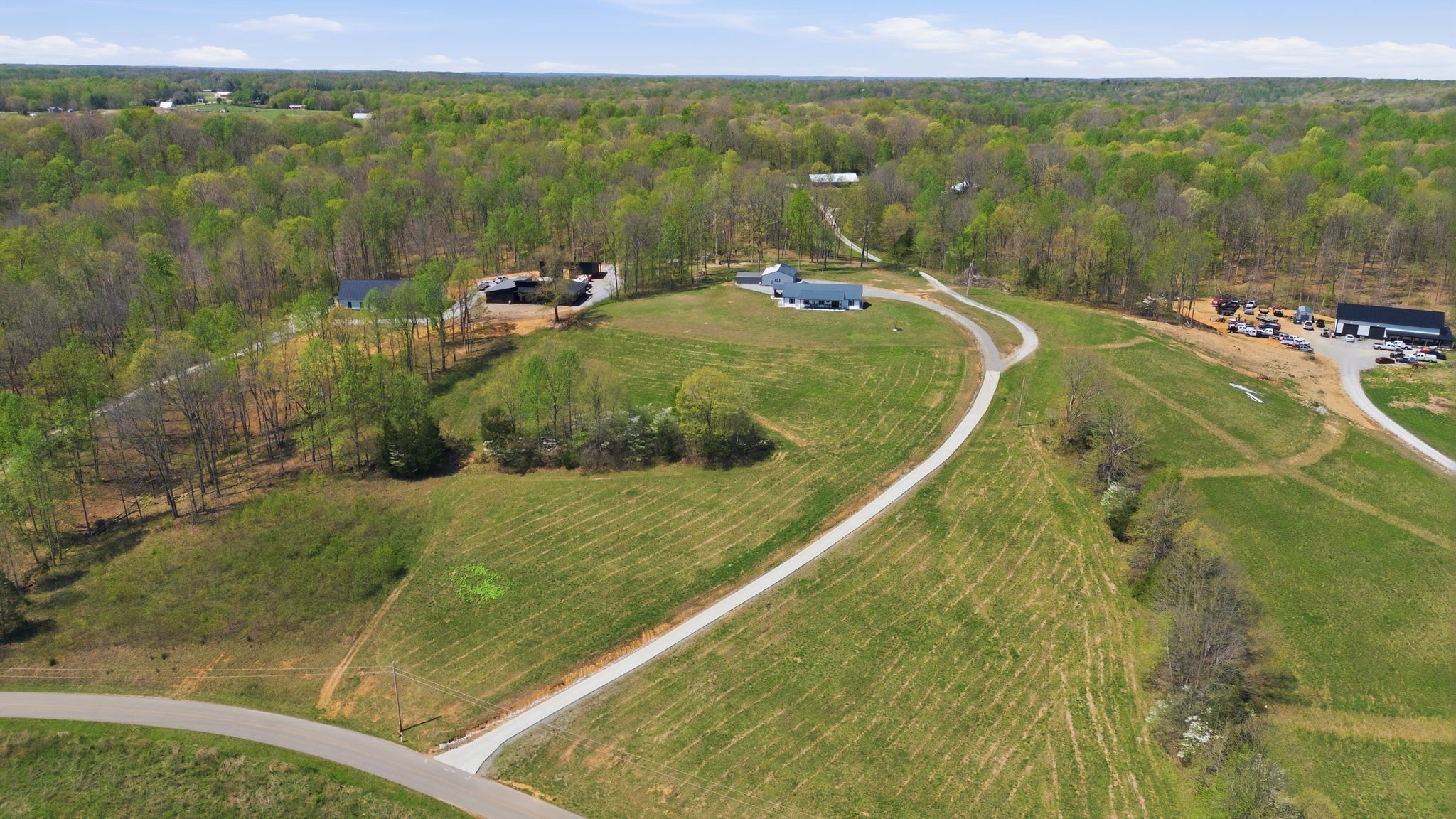 1043 Murphy Hollow Road Vanleer, TN 37181 - Photo 61 of 68 a view of a lake with a yard